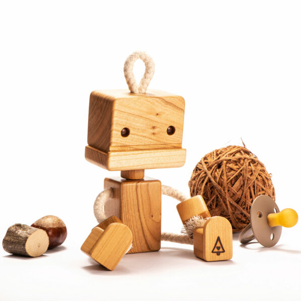 Cute wooden robot toy from cherry wood and cotton, handmade and sustainable