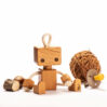 cute wooden baby robot, made from cherry wood and cotton