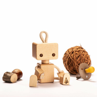 cute wooden baby robot, made from maple wood and cotton