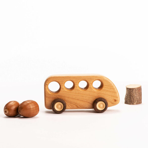 handmade wooden toy bus from cherry wood