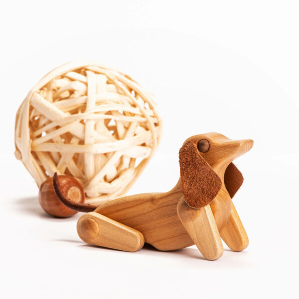 wooden dog toy siting