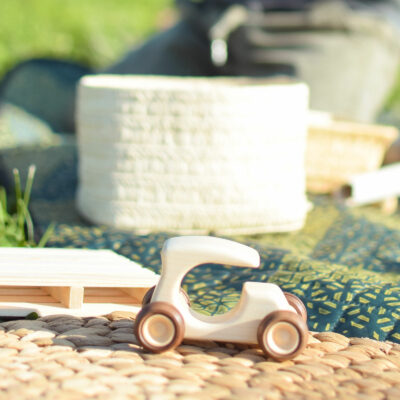 Wooden flintstone car on the playground