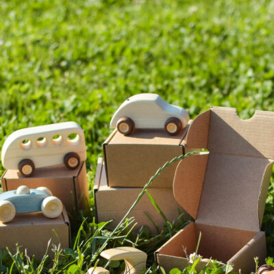 wooden cars on boxes