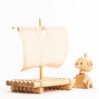 Beautiful wooden toy raft and little robot Titi